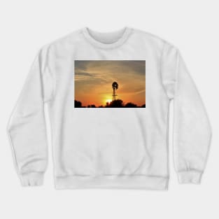 Kansas colorful Sunset with a Windmill silhouette and a bird in the sky. Crewneck Sweatshirt